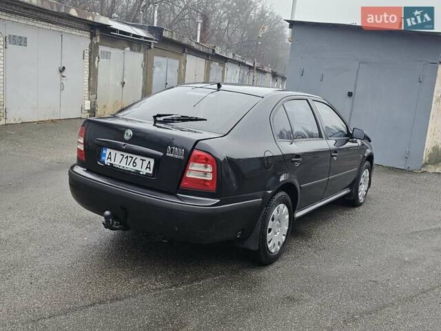 Черный Шкода Октавия, объемом двигателя 1.6 л и пробегом 210 тыс. км за 2000 $, фото 9 на Automoto.ua