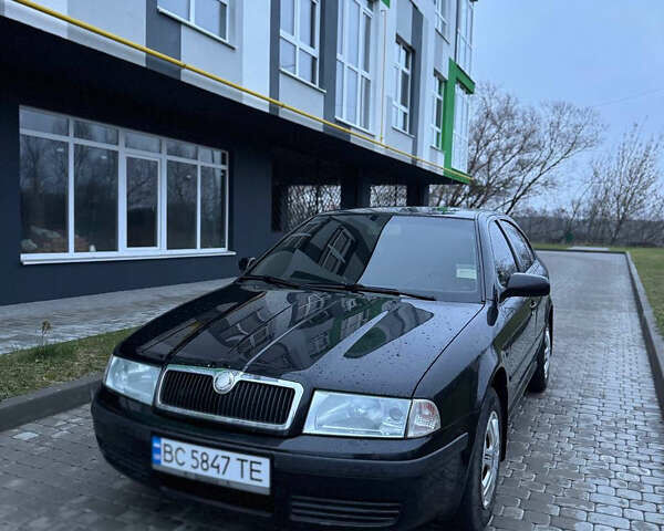 Черный Шкода Октавия, объемом двигателя 1.6 л и пробегом 245 тыс. км за 5400 $, фото 1 на Automoto.ua