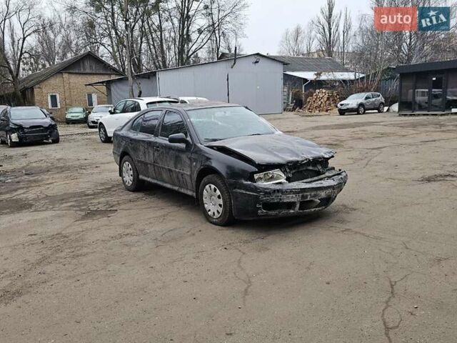 Черный Шкода Октавия, объемом двигателя 1.6 л и пробегом 210 тыс. км за 2350 $, фото 2 на Automoto.ua