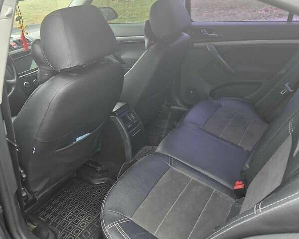 Черный Шкода Октавия, объемом двигателя 1.6 л и пробегом 315 тыс. км за 6300 $, фото 9 на Automoto.ua