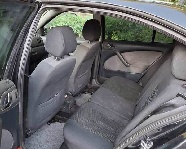 Черный Шкода Октавия, объемом двигателя 1.6 л и пробегом 258 тыс. км за 4800 $, фото 8 на Automoto.ua