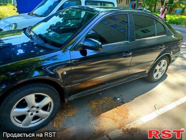 Черный Шкода Октавия, объемом двигателя 1.6 л и пробегом 225 тыс. км за 5900 $, фото 3 на Automoto.ua