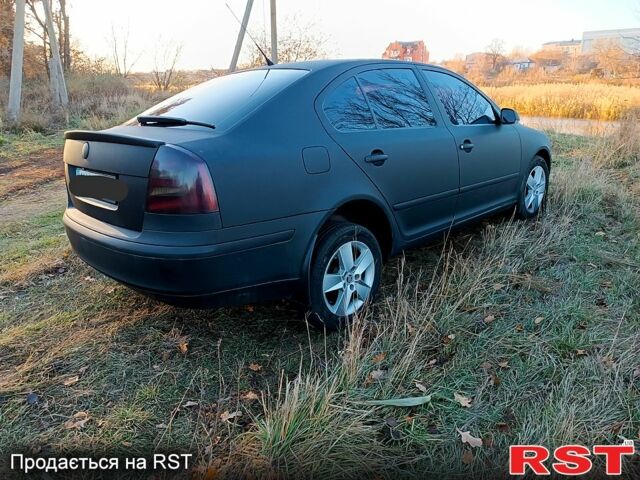 Черный Шкода Октавия, объемом двигателя 16 л и пробегом 302 тыс. км за 5400 $, фото 2 на Automoto.ua