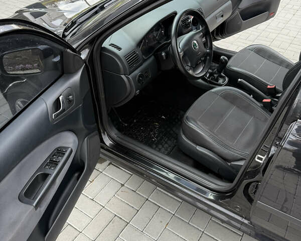 Шкода Октавия 2008 в Харькове на Automoto.ua Черный Шкода Октавия, объемом двигателя 1.6 л и пробегом 201 тыс. км за 6500 $, фото 10 на Automoto.ua