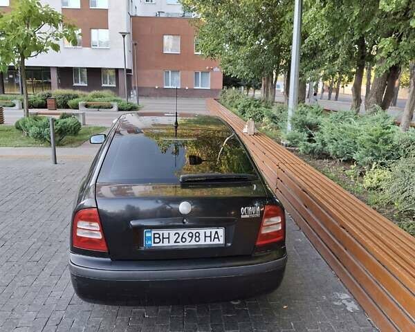 Черный Шкода Октавия, объемом двигателя 1.6 л и пробегом 258 тыс. км за 4800 $, фото 5 на Automoto.ua