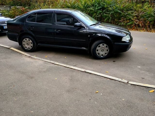 Черный Шкода Октавия, объемом двигателя 1.6 л и пробегом 172 тыс. км за 5999 $, фото 1 на Automoto.ua