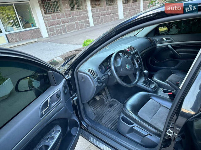 Черный Шкода Октавия, объемом двигателя 2 л и пробегом 172 тыс. км за 6700 $, фото 7 на Automoto.ua