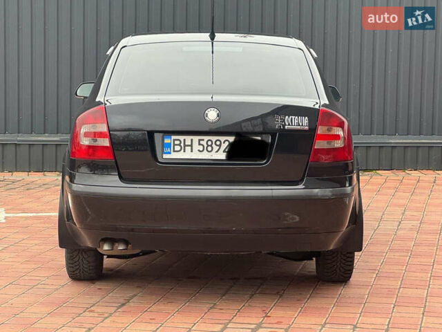 Черный Шкода Октавия, объемом двигателя 2 л и пробегом 230 тыс. км за 6950 $, фото 6 на Automoto.ua