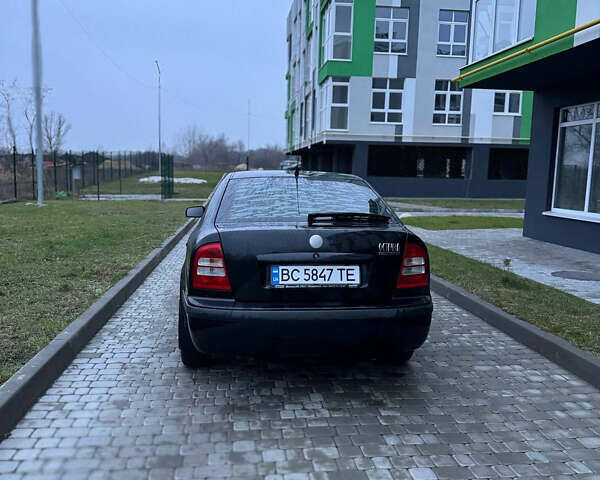 Черный Шкода Октавия, объемом двигателя 1.6 л и пробегом 245 тыс. км за 5400 $, фото 9 на Automoto.ua