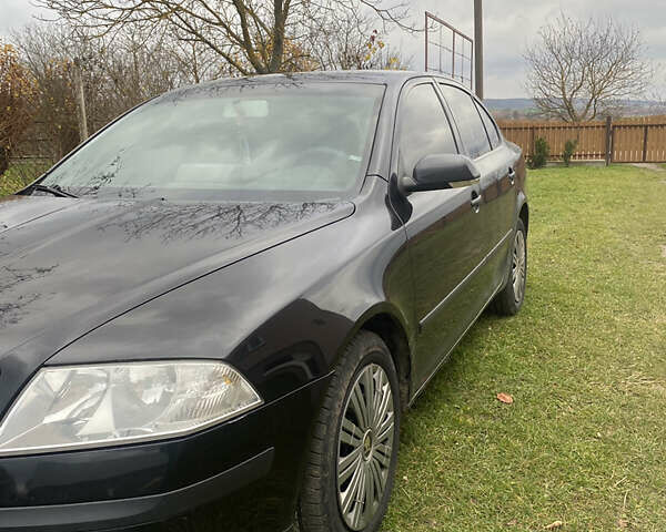 Черный Шкода Октавия, объемом двигателя 1.8 л и пробегом 346 тыс. км за 4600 $, фото 1 на Automoto.ua