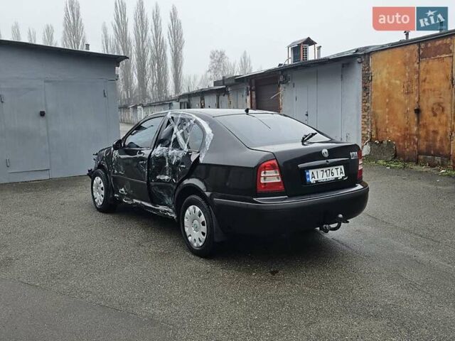 Черный Шкода Октавия, объемом двигателя 1.6 л и пробегом 210 тыс. км за 2200 $, фото 4 на Automoto.ua