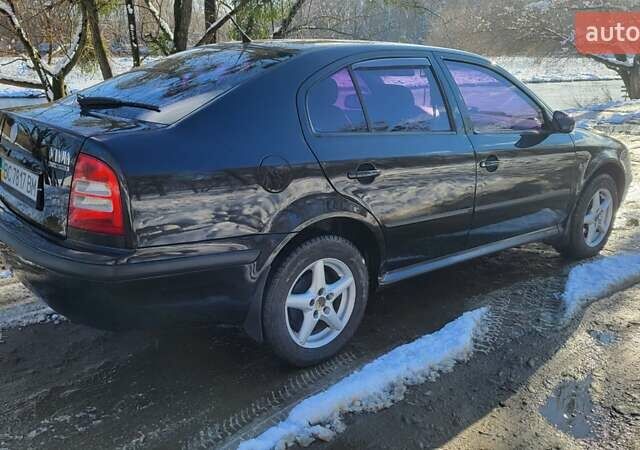 Черный Шкода Октавия, объемом двигателя 1.6 л и пробегом 230 тыс. км за 4800 $, фото 11 на Automoto.ua