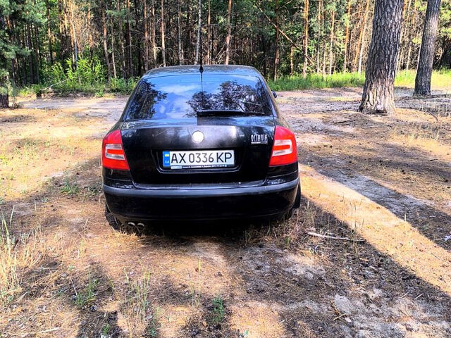 Черный Шкода Октавия, объемом двигателя 2 л и пробегом 195 тыс. км за 6250 $, фото 3 на Automoto.ua