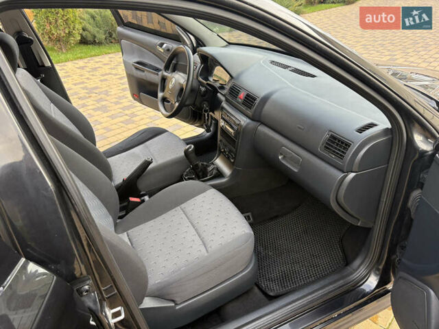 Чорний Шкода Октавія, об'ємом двигуна 1.6 л та пробігом 241 тис. км за 5700 $, фото 15 на Automoto.ua