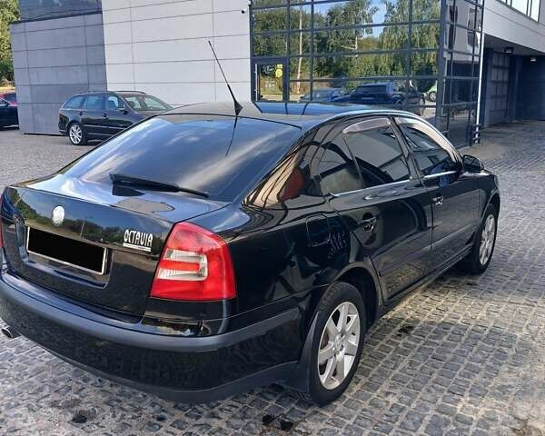 Черный Шкода Октавия, объемом двигателя 1.6 л и пробегом 285 тыс. км за 5700 $, фото 3 на Automoto.ua