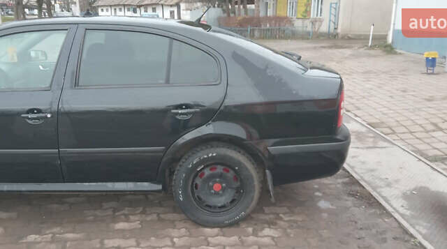 Черный Шкода Октавия, объемом двигателя 1.6 л и пробегом 250 тыс. км за 5700 $, фото 4 на Automoto.ua