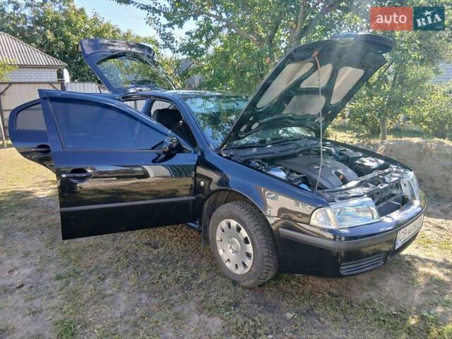 Черный Шкода Октавия, объемом двигателя 1.6 л и пробегом 183 тыс. км за 6000 $, фото 7 на Automoto.ua