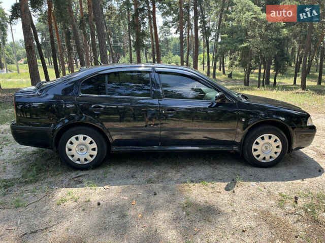 Черный Шкода Октавия, объемом двигателя 1.6 л и пробегом 200 тыс. км за 5800 $, фото 6 на Automoto.ua