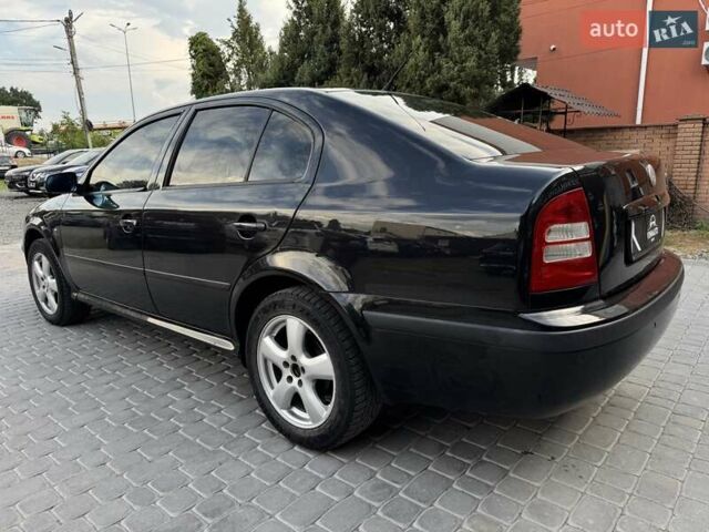Чорний Шкода Октавія, об'ємом двигуна 1.6 л та пробігом 226 тис. км за 5600 $, фото 11 на Automoto.ua