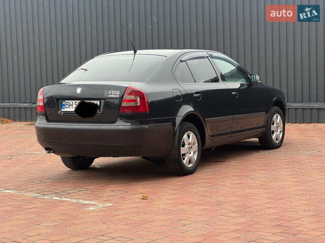 Черный Шкода Октавия, объемом двигателя 2 л и пробегом 230 тыс. км за 6950 $, фото 7 на Automoto.ua