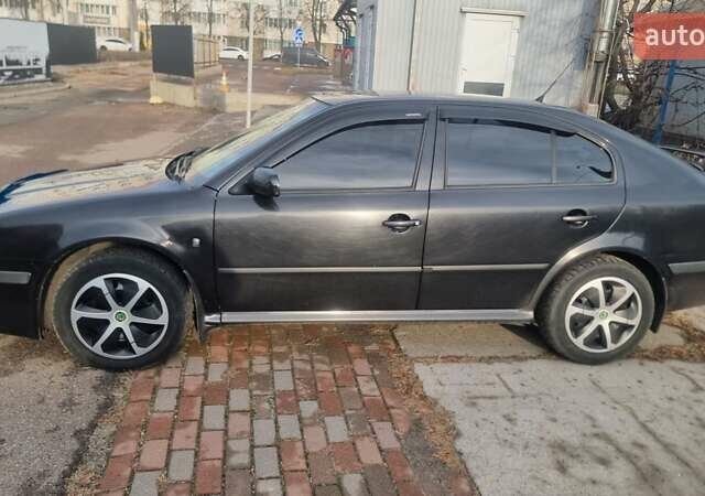 Черный Шкода Октавия, объемом двигателя 1.8 л и пробегом 319 тыс. км за 7400 $, фото 2 на Automoto.ua