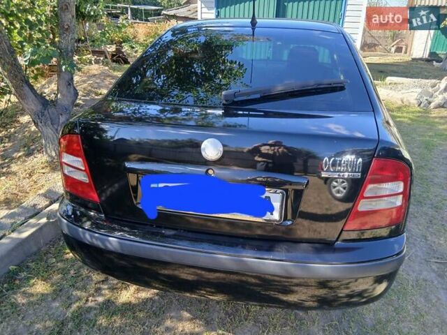 Черный Шкода Октавия, объемом двигателя 1.6 л и пробегом 183 тыс. км за 6000 $, фото 3 на Automoto.ua