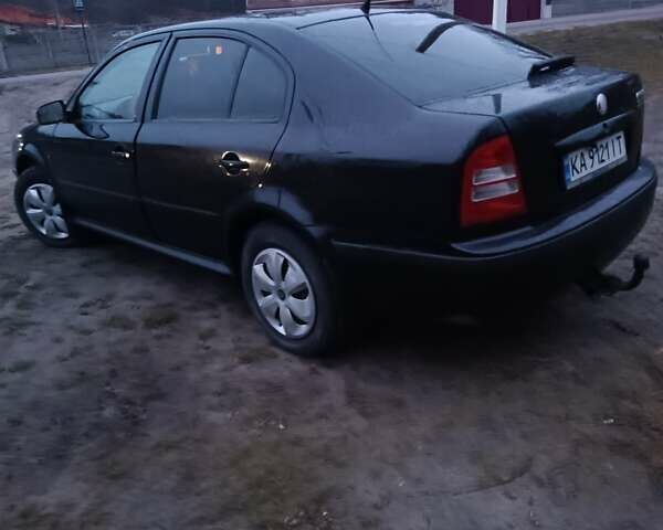 Черный Шкода Октавия, объемом двигателя 1.6 л и пробегом 431 тыс. км за 5500 $, фото 7 на Automoto.ua
