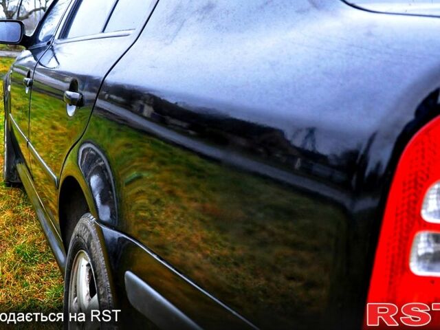 Чорний Шкода Октавія, об'ємом двигуна 1.8 л та пробігом 220 тис. км за 4500 $, фото 9 на Automoto.ua