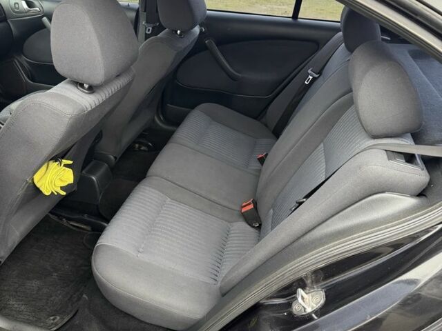 Черный Шкода Октавия, объемом двигателя 1.8 л и пробегом 355 тыс. км за 4700 $, фото 6 на Automoto.ua