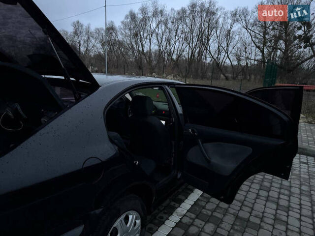 Черный Шкода Октавия, объемом двигателя 1.6 л и пробегом 245 тыс. км за 5400 $, фото 28 на Automoto.ua