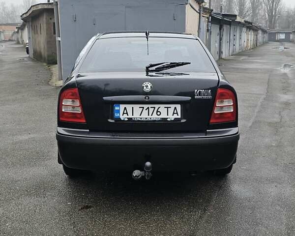 Черный Шкода Октавия, объемом двигателя 1.6 л и пробегом 210 тыс. км за 2000 $, фото 6 на Automoto.ua