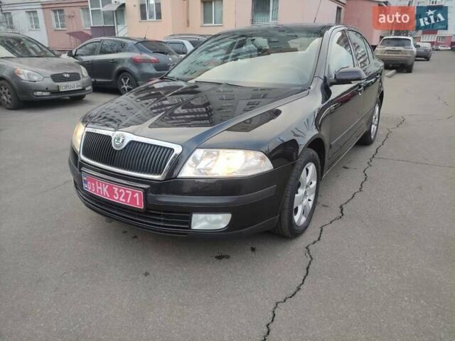 Черный Шкода Октавия, объемом двигателя 1.6 л и пробегом 198 тыс. км за 6999 $, фото 1 на Automoto.ua