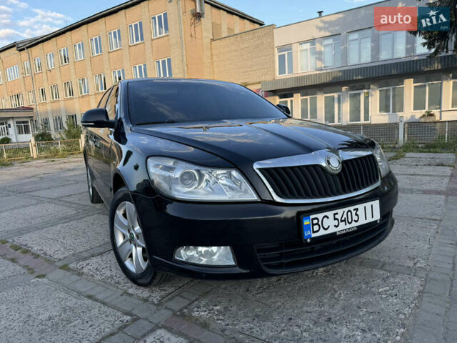 Черный Шкода Октавия, объемом двигателя 1.6 л и пробегом 245 тыс. км за 6399 $, фото 2 на Automoto.ua