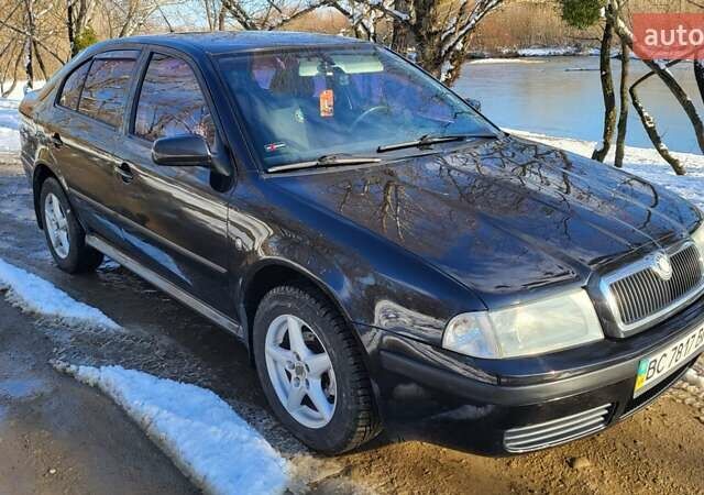 Черный Шкода Октавия, объемом двигателя 1.6 л и пробегом 230 тыс. км за 4800 $, фото 8 на Automoto.ua