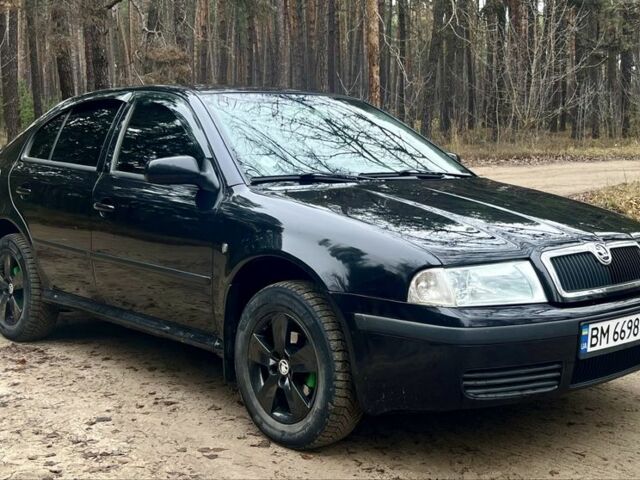 Черный Шкода Октавия, объемом двигателя 1.6 л и пробегом 286 тыс. км за 5500 $, фото 7 на Automoto.ua