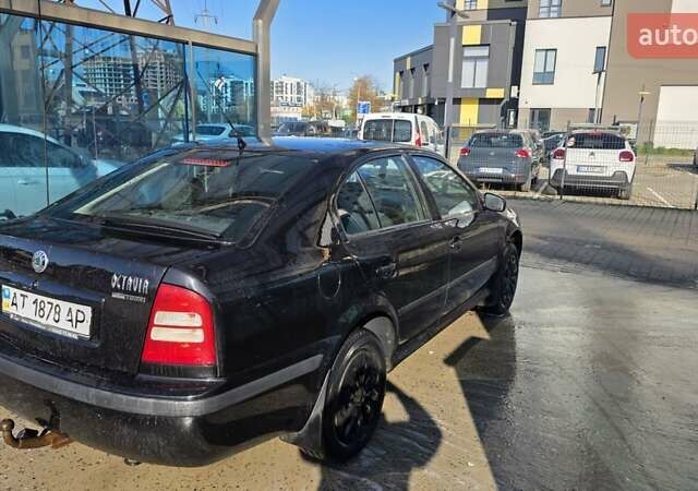 Черный Шкода Октавия, объемом двигателя 1.6 л и пробегом 166 тыс. км за 5550 $, фото 2 на Automoto.ua