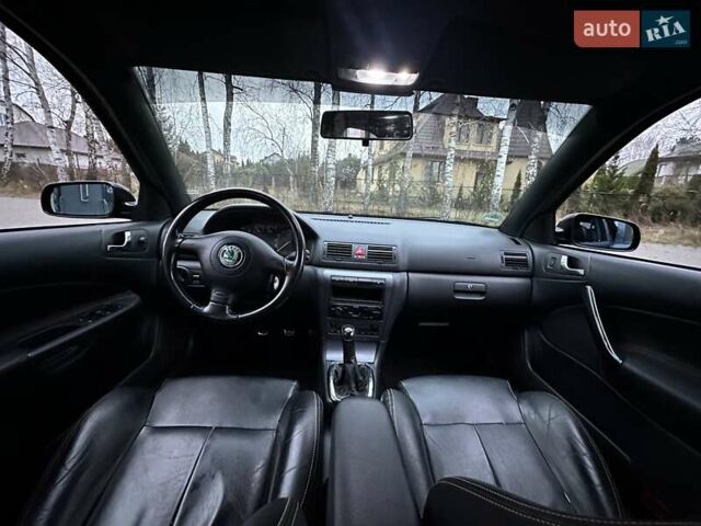 Черный Шкода Октавия, объемом двигателя 1.8 л и пробегом 164 тыс. км за 7500 $, фото 12 на Automoto.ua