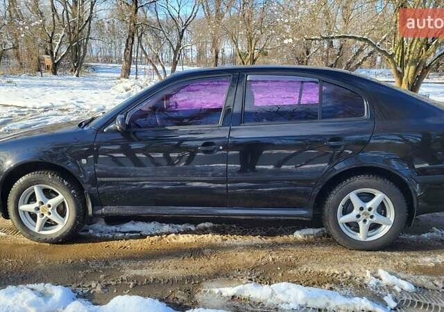 Черный Шкода Октавия, объемом двигателя 1.6 л и пробегом 230 тыс. км за 4800 $, фото 4 на Automoto.ua