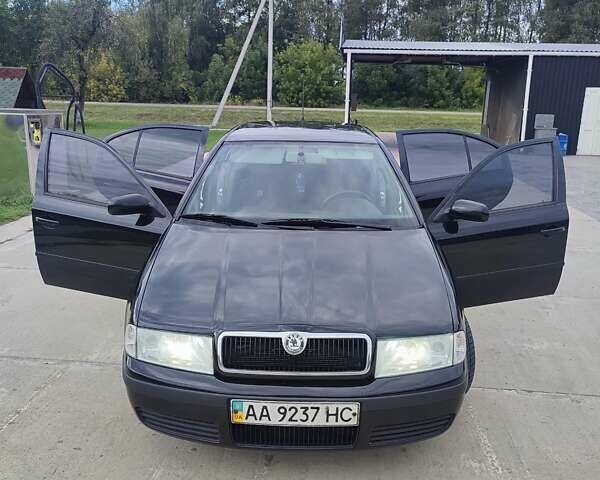 Черный Шкода Октавия, объемом двигателя 1.6 л и пробегом 232 тыс. км за 4850 $, фото 29 на Automoto.ua