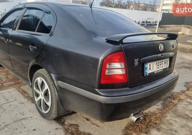 Черный Шкода Октавия, объемом двигателя 1.8 л и пробегом 319 тыс. км за 7400 $, фото 10 на Automoto.ua