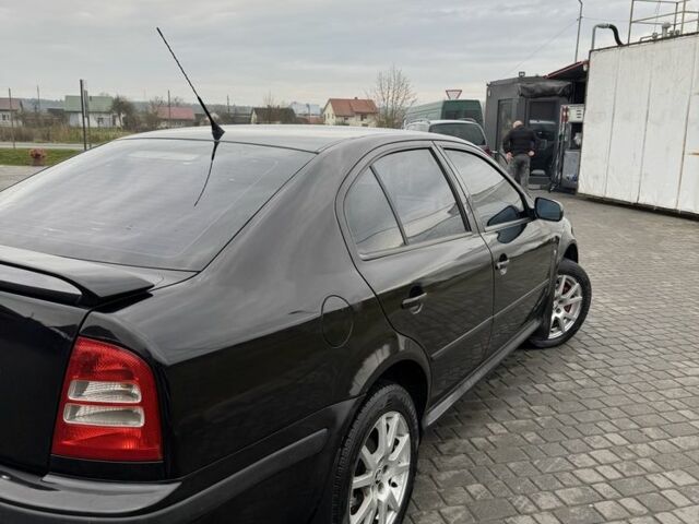 Черный Шкода Октавия, объемом двигателя 1.8 л и пробегом 355 тыс. км за 4700 $, фото 2 на Automoto.ua