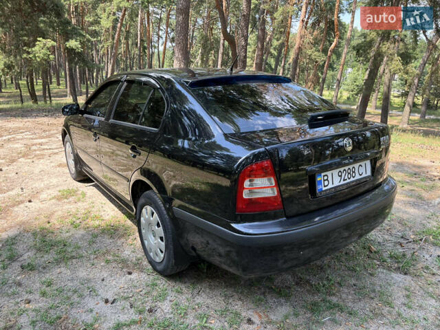 Черный Шкода Октавия, объемом двигателя 1.6 л и пробегом 200 тыс. км за 5800 $, фото 3 на Automoto.ua