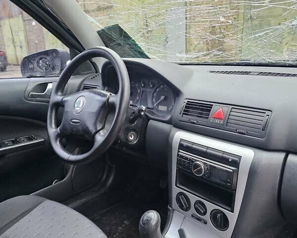 Черный Шкода Октавия, объемом двигателя 1.6 л и пробегом 210 тыс. км за 2350 $, фото 12 на Automoto.ua