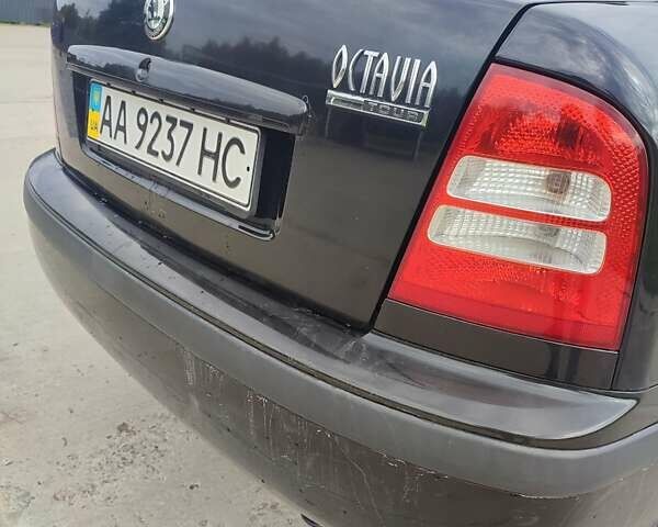 Черный Шкода Октавия, объемом двигателя 1.6 л и пробегом 232 тыс. км за 4850 $, фото 9 на Automoto.ua