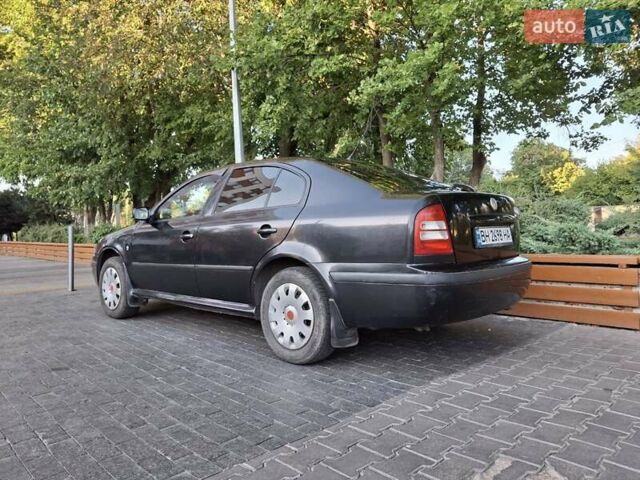 Черный Шкода Октавия, объемом двигателя 1.6 л и пробегом 258 тыс. км за 4800 $, фото 4 на Automoto.ua