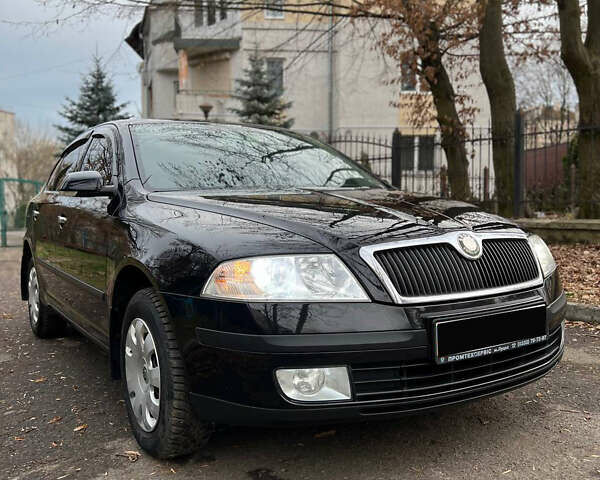 Черный Шкода Октавия, объемом двигателя 1.6 л и пробегом 211 тыс. км за 6800 $, фото 4 на Automoto.ua