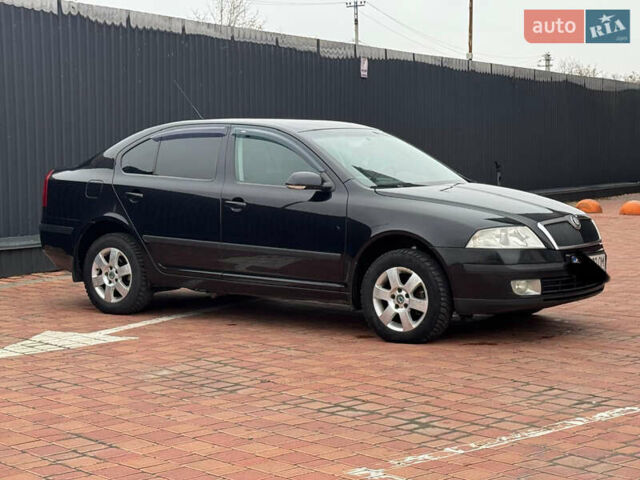 Черный Шкода Октавия, объемом двигателя 2 л и пробегом 230 тыс. км за 6950 $, фото 4 на Automoto.ua