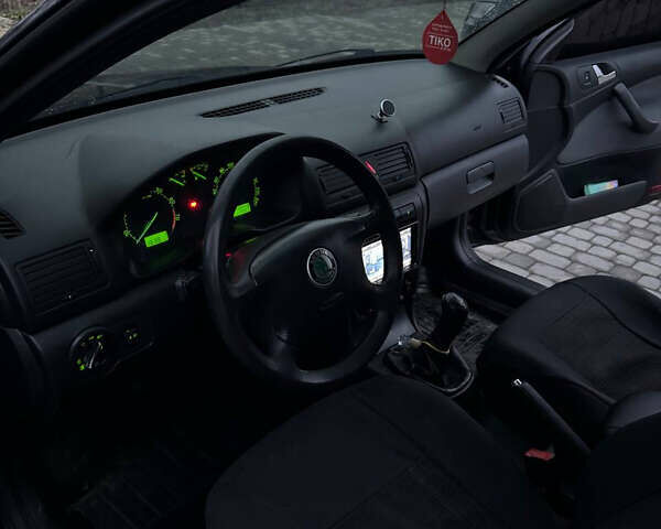 Черный Шкода Октавия, объемом двигателя 1.6 л и пробегом 245 тыс. км за 5400 $, фото 22 на Automoto.ua