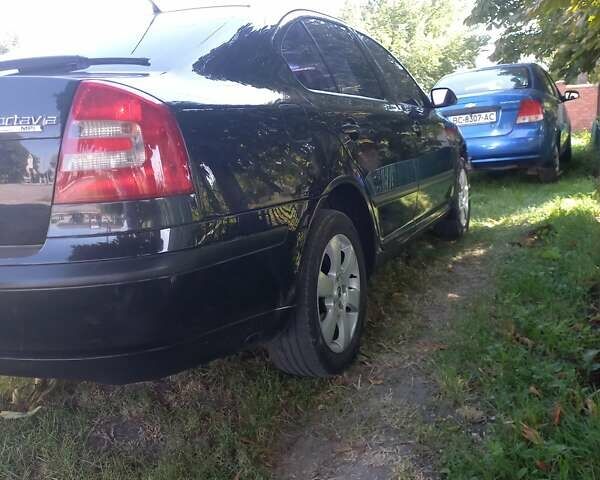 Черный Шкода Октавия, объемом двигателя 1.62 л и пробегом 210 тыс. км за 6500 $, фото 9 на Automoto.ua