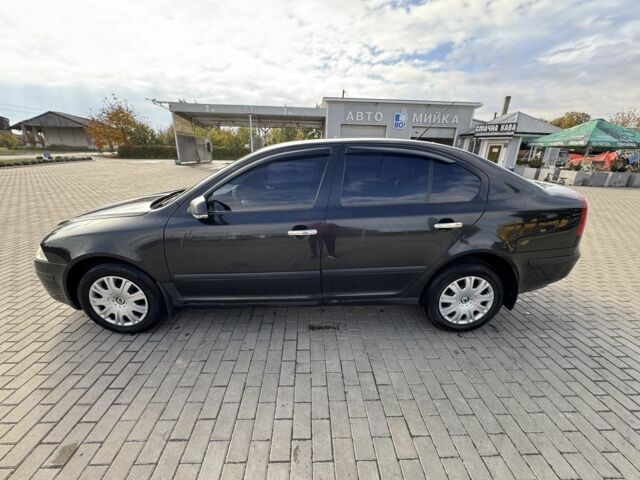 Черный Шкода Октавия, объемом двигателя 2 л и пробегом 266 тыс. км за 5900 $, фото 1 на Automoto.ua